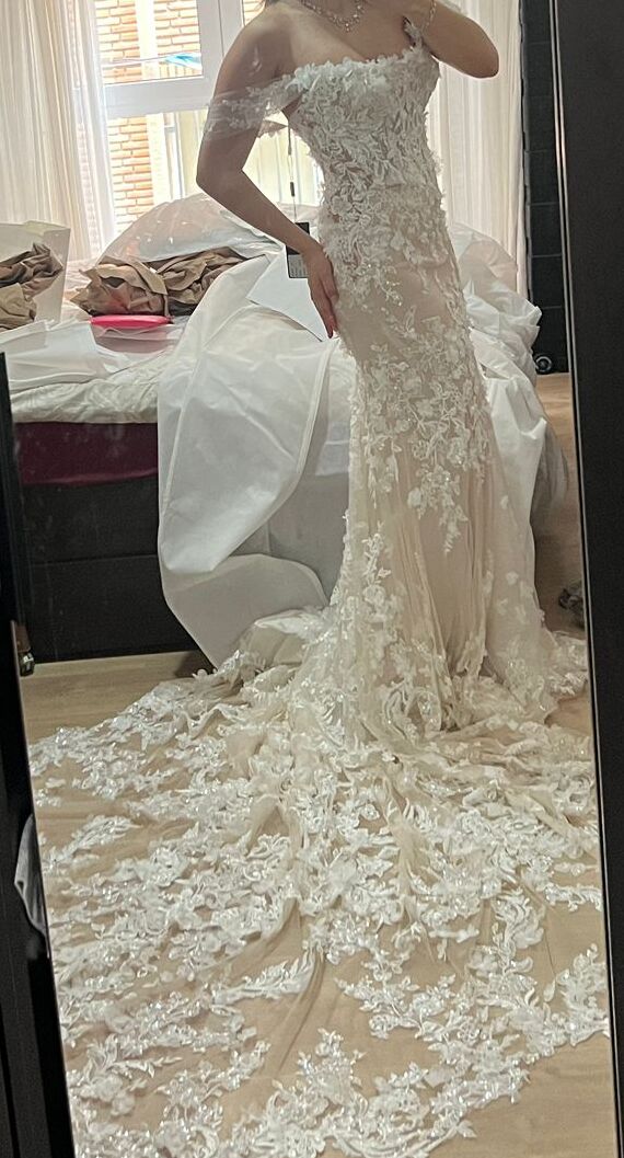 Reducción de cola en vestido de novia personalizado